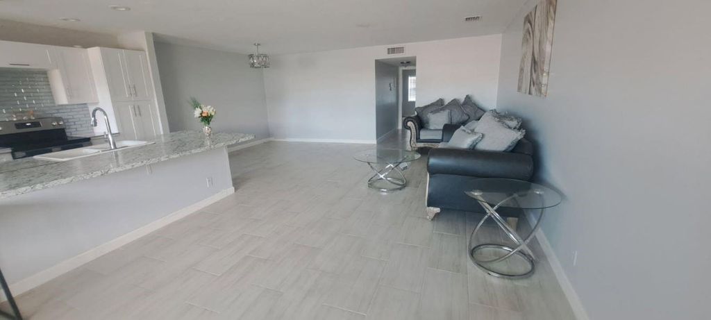 Photo of 14588 Canalview Dr #C, Delray Beach, FL 33484 (MLS # F10525838)