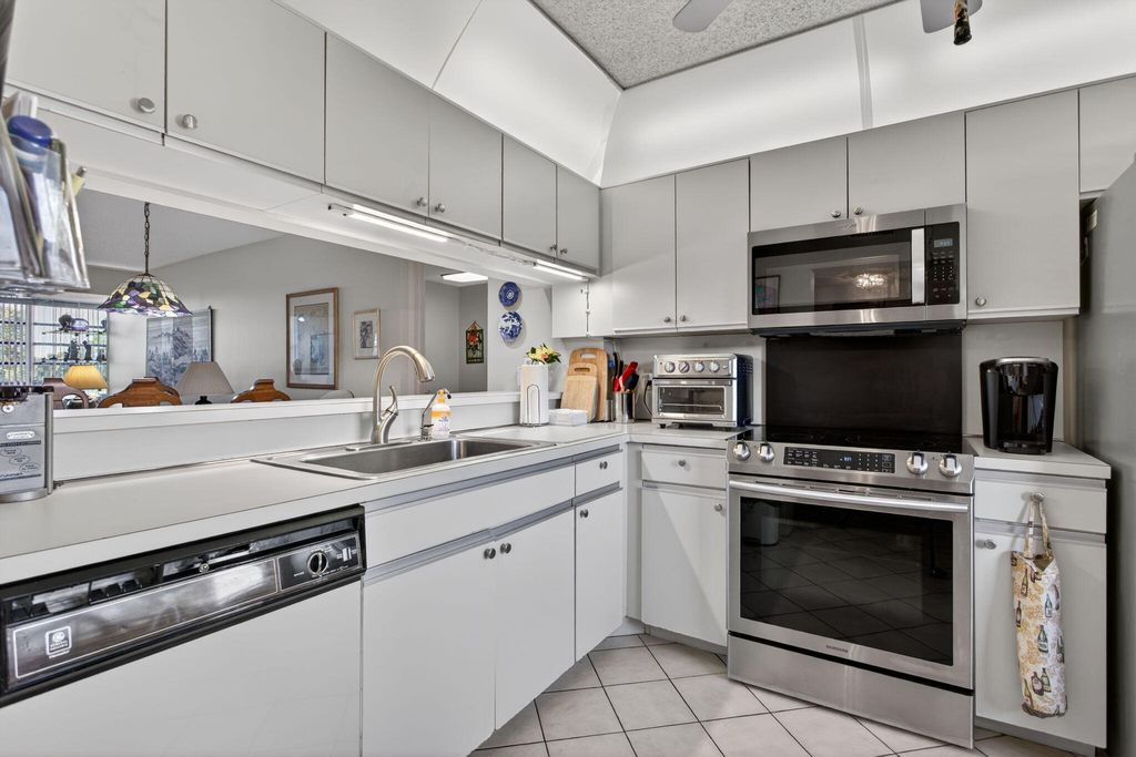 Photo of 4091 Cypress Reach Court #302, Pompano Beach, FL 33069 (MLS # B26007763)