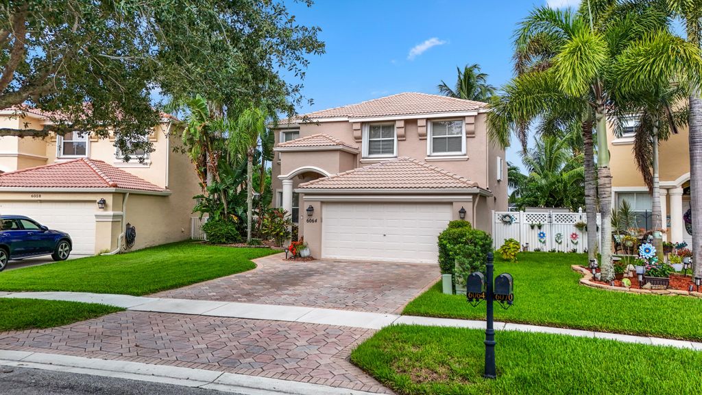 Photo of 6064 Oak Bluff Way, Lake Worth, FL 33467 (MLS # R11000064)