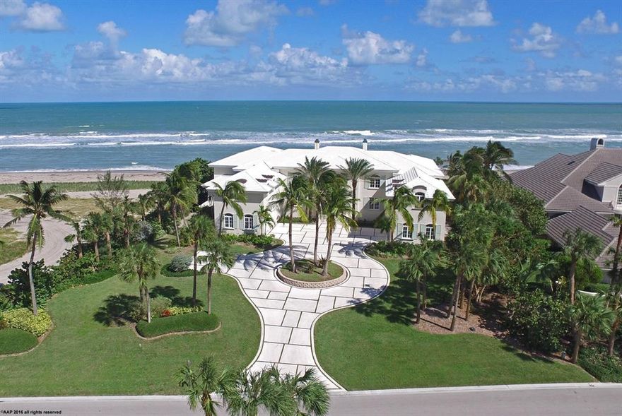 PRICED BELOW RECENT PROFESSIONAL APPRAISAL! Discover this truly magnificent oceanfront estate located in Sailfish Point! The unique selling proposition of this oceanfront home is it is the only home available with mile views of the beach to the North & the South. In addition, it is an easy short walk to the Marina with the ability for all size vessels, including yachts up to 130ft. For protection this home also has a newer seawall on the ocean side, which is extremely rare for oceanfront homes in Florida. This stunning estate on over an acre of land and 150+ feet of beach frontage is designed for grand entertaining or luxurious, casually elegant beachside living and offers a sprawling floor plan.