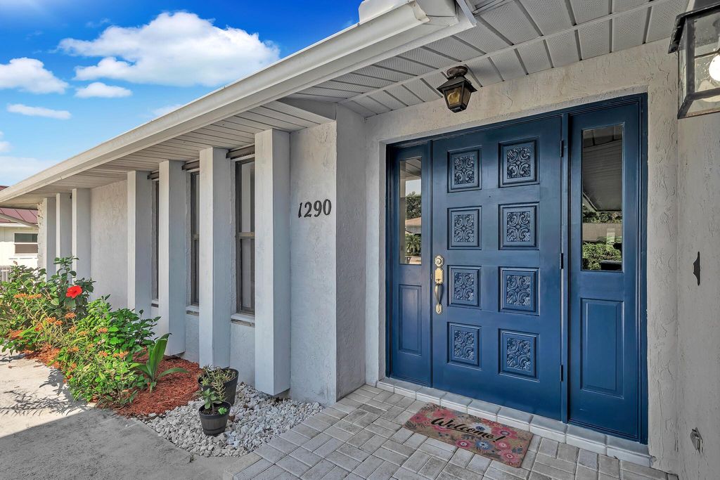 Photo of 1290 SE Mcfarlane Avenue, Port Saint Lucie, FL 34952 (MLS # R11091643)