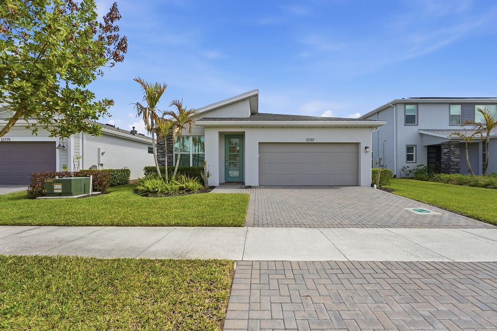 Photo of 12767 SW Phoenix Drive, Port Saint Lucie, FL 34987 (MLS # B26012801)