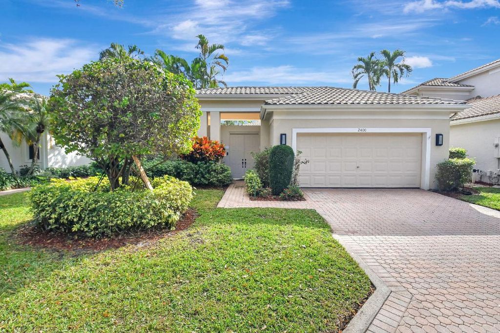 Photo of 2400 NW 67th Street, Boca Raton, FL 33496 (MLS # R11052054)