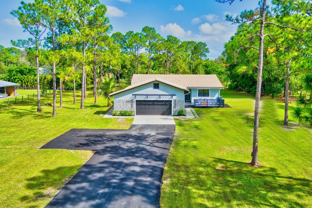 Photo of 16676 123rd Terrace N, Jupiter, FL 33478 (MLS # R10948408)