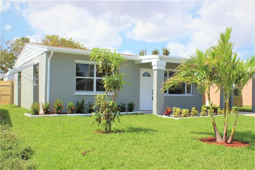 Gorgeous Single Family House, all remodeled, new Marble floors, brand new kitchen with granite counter tops, new wood cabinets, stainless steel appliances, new AC, new water heater, all new wood fence, excellent condition, just painted inside and outside, all ceiling fans are new. This is the house you are looking for, nothing to be done, ready to move in. All windows with hurricane shutters, front landscape new.