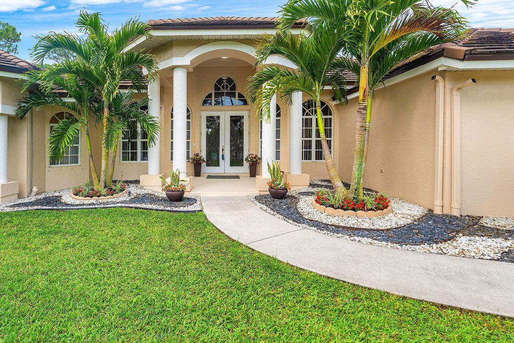 Photo of 12328 85th Road N, West Palm Beach, FL 33412 (MLS # B26018044)