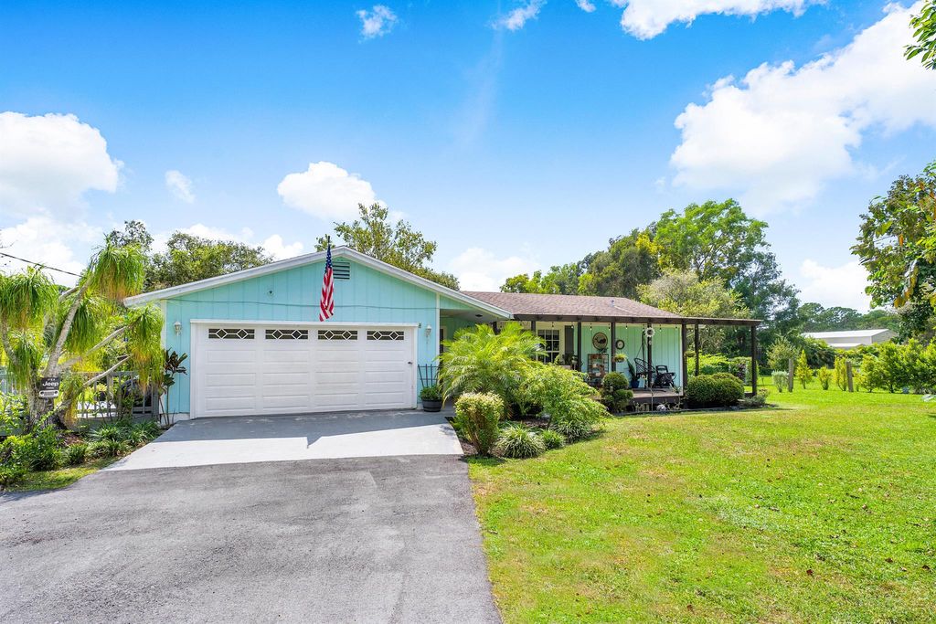 Photo of 13886 158th Street N, Jupiter, FL 33478 (MLS # R10920941)