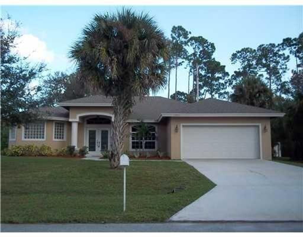 Photo of 2004 SW Bird Avenue, Port Saint Lucie, FL 34984 (MLS # R11022925)