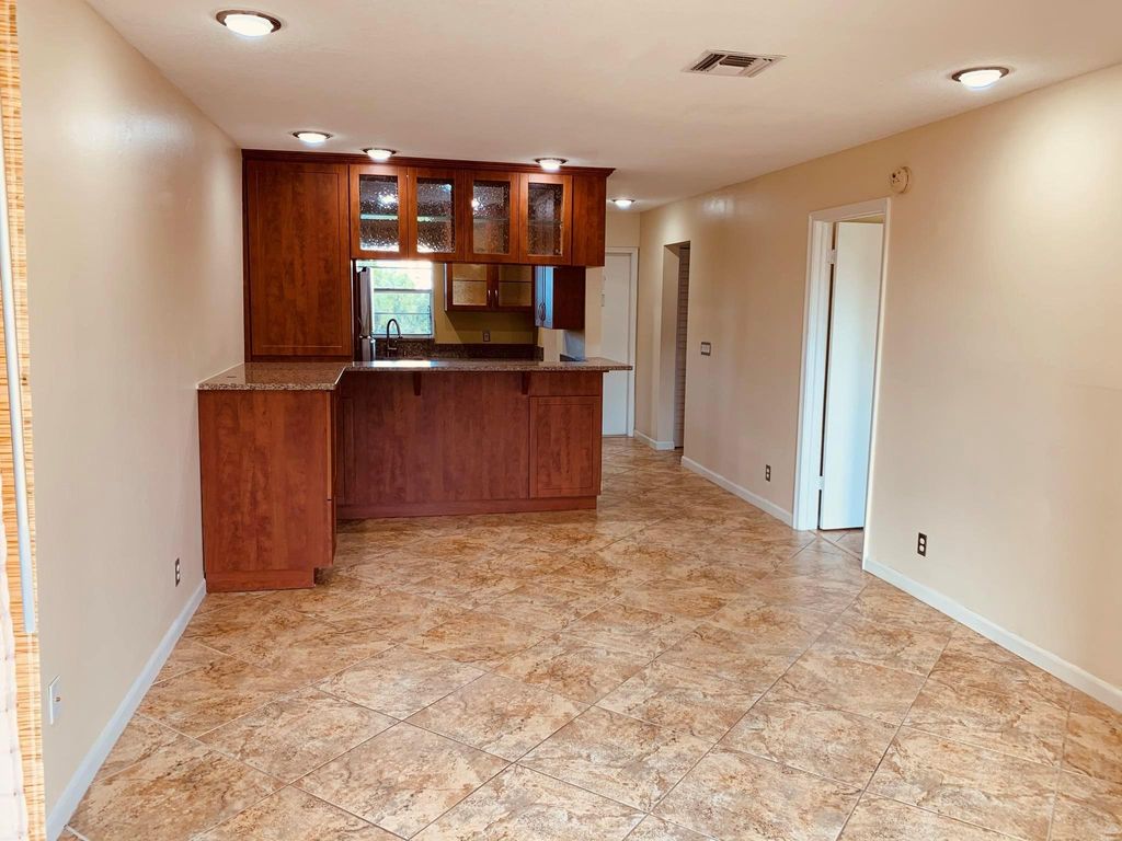 Photo of 1638 Embassy Drive #407, West Palm Beach, FL 33401 (MLS # R11116300)