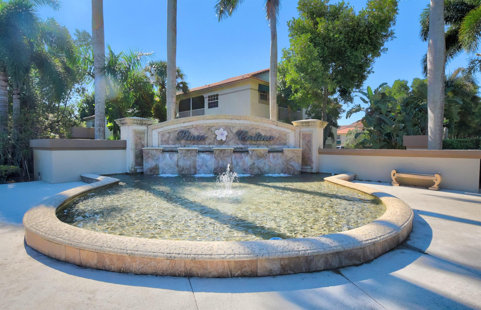 Welcome to this desirable home in Cortina/The Plum, in the sought after community of Boca Pointe Country Club. This home offers a renovated kitchen with all newer appliances, NEW PIPES, ceramic tile floors in all living areas, 3 spacious bedrooms and 2.5 baths (half bath has been completely renovated), a separate laundry room located on the second level, and a 1 car garage. The landscaped backyard offers private relaxation. Upon entering this townhome, you'll be impressed with the spacious interior and open living floor plan. The screened-in patio area offers a wonderful, private space to enjoy your morning coffee or a quiet afternoon. The HOA provides exceptional value, covering basic cable, internet, roof, building insurance, 24/7 manned security gate, community pool,