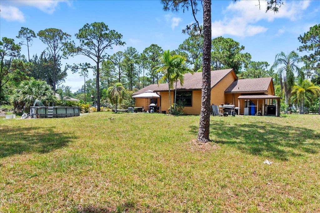 Photo of 12610 63rd Lane N, West Palm Beach, FL 33412 (MLS # R10990318)