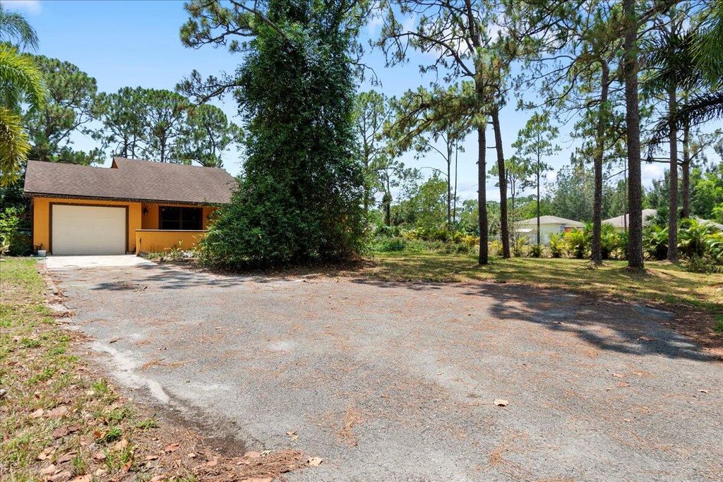 Photo of 12610 63rd Lane N, West Palm Beach, FL 33412 (MLS # R10990318)