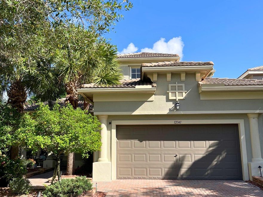 Nestled within one of Florida's most coveted luxury gated communities, this Mediterranean-style updated 4 bed 3 bath with loft home features multiple glass doors that lead you to your crystal clear salt water pool where bug-free evenings and breezy afternoons await in the screened in lanai. An updated chefs kitchen with dual convection oven is a chefs dream. This open concept home is perfect for entertaining. Ceramic tile and engineered laminate adorn this spectacular home. The upgraded spa-inspired master bathroom is tranquil with a soaking tub, a spacious walk-in shower and luxurious marble finishes. This is the ultimate in Florida resort-style living! Close to parks and shopping. Manned guard gates with 24/7 patrol. A+schools.
