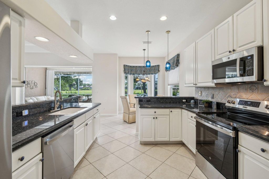 Photo of 4596 NW Wandering Oak Court, Jensen Beach, FL 34957 (MLS # R11084646)