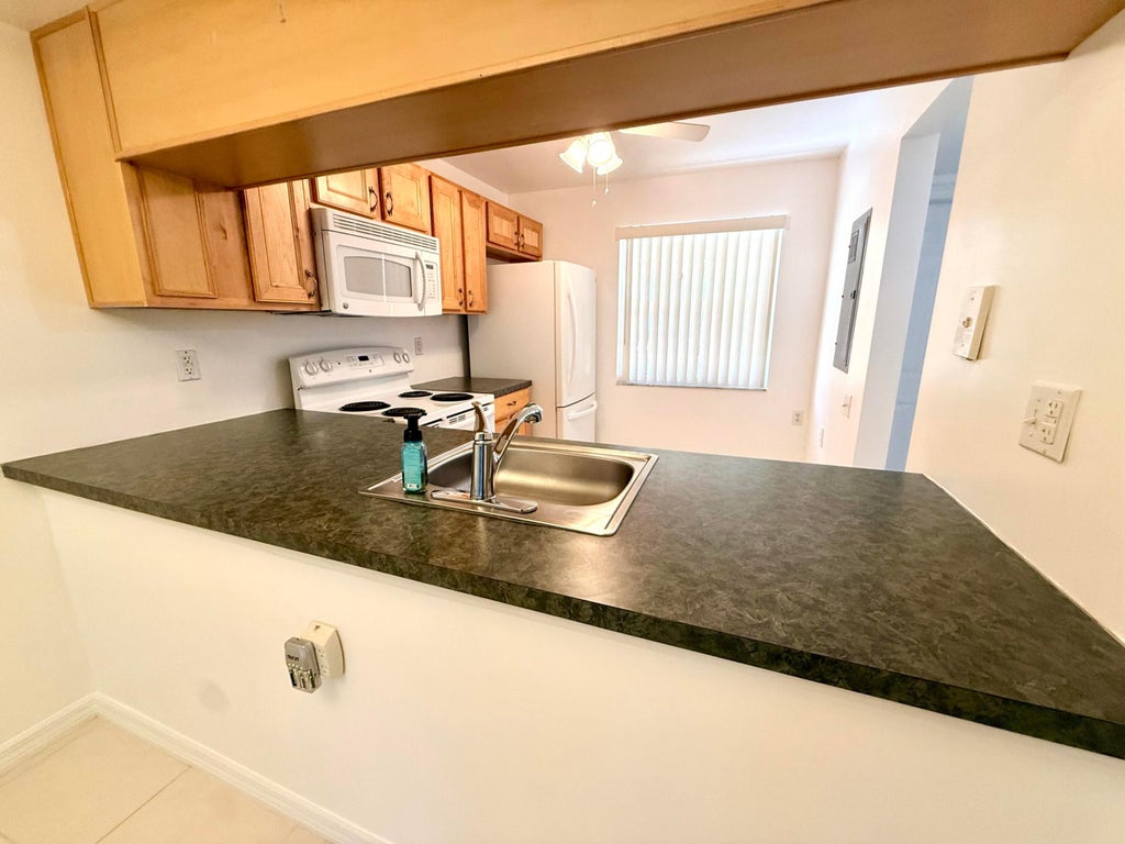 Photo of 1105 Bahama Bend #B1, Coconut Creek, FL 33066 (MLS # B26089236)