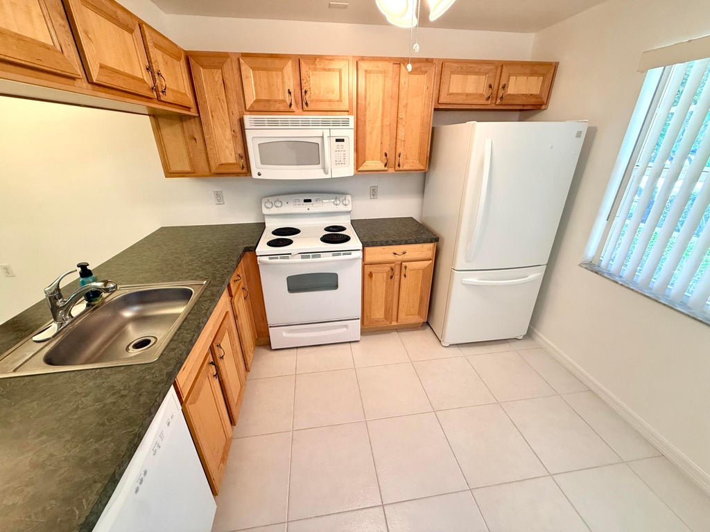 Photo of 1105 Bahama Bend #B1, Coconut Creek, FL 33066 (MLS # B26089236)