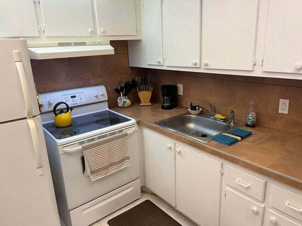 Photo of 59 Tilford C #59, Deerfield Beach, FL 33442 (MLS # R11108064)