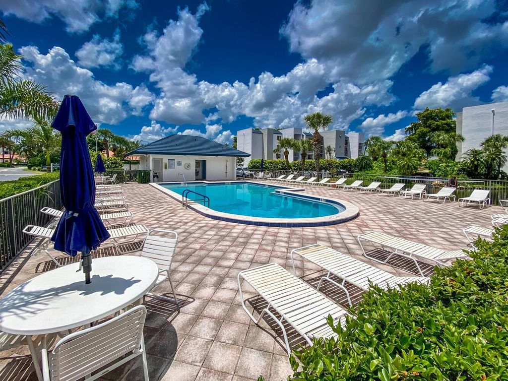 Photo of 1605 S Us Highway 1 #B101, Jupiter, FL 33477 (MLS # R11089619)