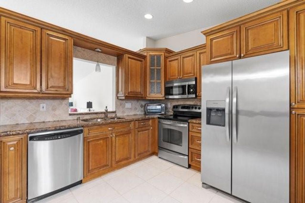 Photo of 8322 Springlake Drive #8322, Boca Raton, FL 33496 (MLS # F10484323)