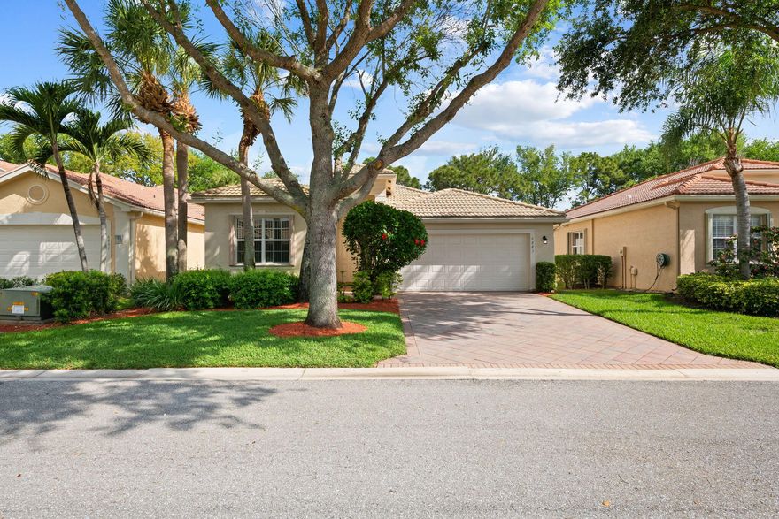 Immaculately maintained, this spacious, bright, and open one-story home sits in the highly sought-after Valencia Pointe community in Boynton Beach. Configured as a 2-bedroom plus den, 2-bath residence, it offers flexible space ideal for a home office or guest room. Enjoy a covered back patio overlooking a large, private yard—perfect for relaxing or entertaining. Recently painted with brand-new appliances, this home is truly move-in ready. Valencia Pointe is a premier 55+ community with resort-style amenities including a pool, pickleball, fitness center, café, and a vibrant social calendar. Conveniently located near shopping, dining, and medical facilities—experience the best of South Florida living in an active, welcoming setting.