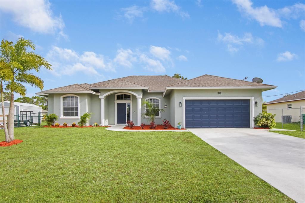 Photo of 1218 SW Bargello Avenue, Port Saint Lucie, FL 34953 (MLS # R10718066)