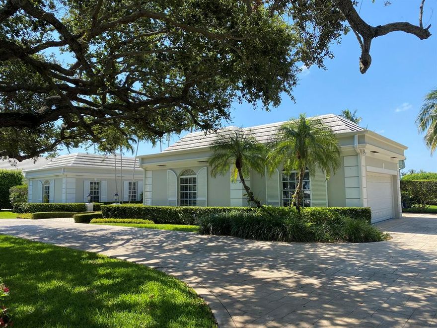 BEAUTIFUL VIEW OF PELICAN LAKE. WALKING DISTANCE TO THE OCEAN AND BEACH CLUB. Don't miss seeing this conveniently located remodeled residence one block from the beach club and gate, two blocks from the golf club and health club!  Spectacular water views from the kitchen, family room, dining room, loggia, living room and master bedroom! The southern exposure provides sun on the pool area the entire day with south easterly breezes! The total sq ft in this beautiful residence is 5,243 and the total sq ft of land is 21,340. It features 5 bedrooms and 4 1/2 baths! Don't miss seeing this spectacular home located on one of the best waterfront lots in Lost Tree Village.