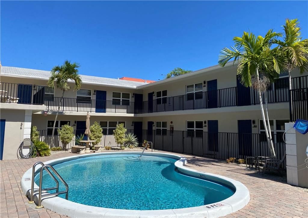 Photo of 660 NE 11th Ave #201, Fort Lauderdale, FL 33304 (MLS # F10392882)