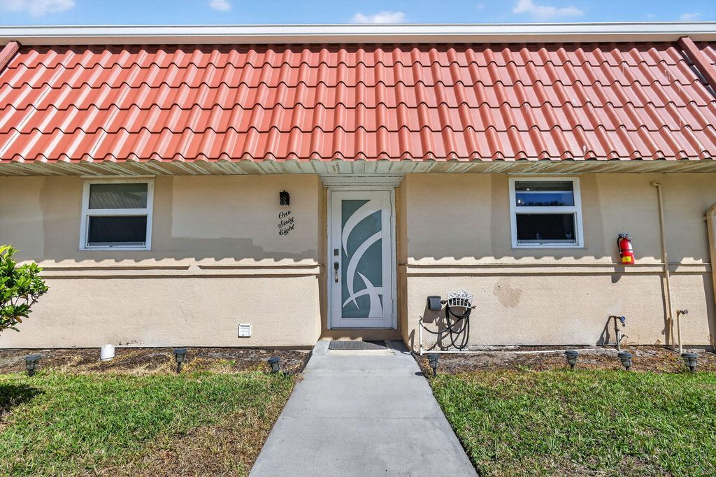 Photo of 168 Amherst Lane, Lake Worth Beach, FL 33467 (MLS # R11166786)