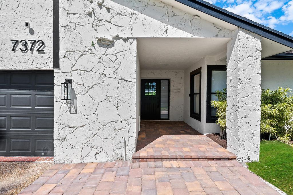 Photo of 7372 San Sebastian Drive, Boca Raton, FL 33433 (MLS # R11068471)