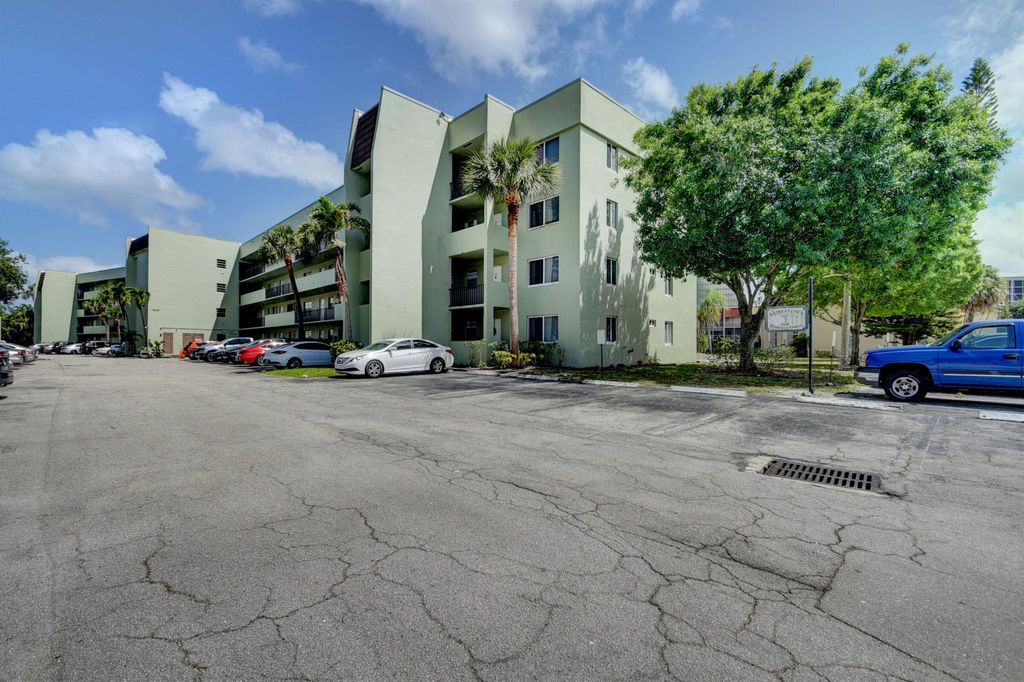 Photo of 1638 Embassy Drive #208, West Palm Beach, FL 33401 (MLS # R11130358)