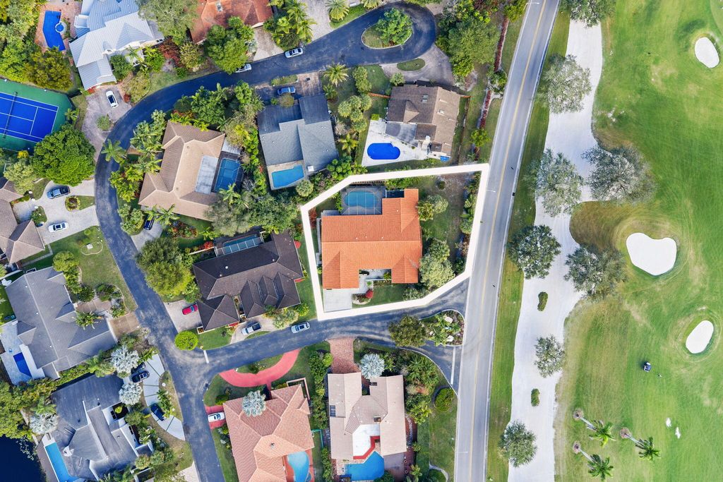 Photo of 301 Jacaranda Drive, Plantation, FL 33324 (MLS # B26016833)