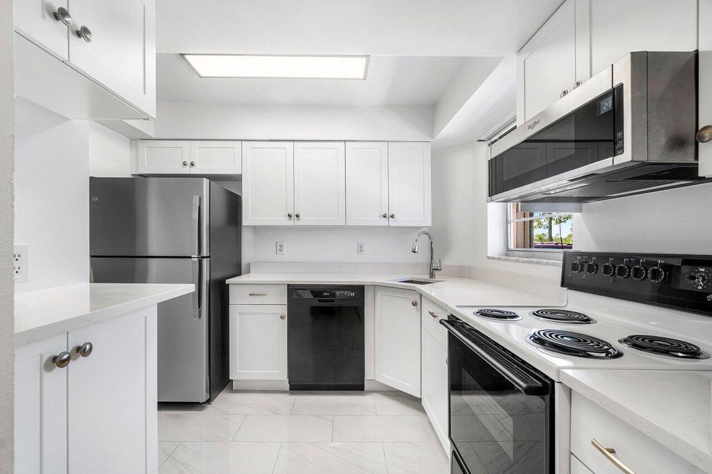 Photo of 18081 SE Country Club Drive #32-311, Jupiter, FL 33469 (MLS # R11091314)