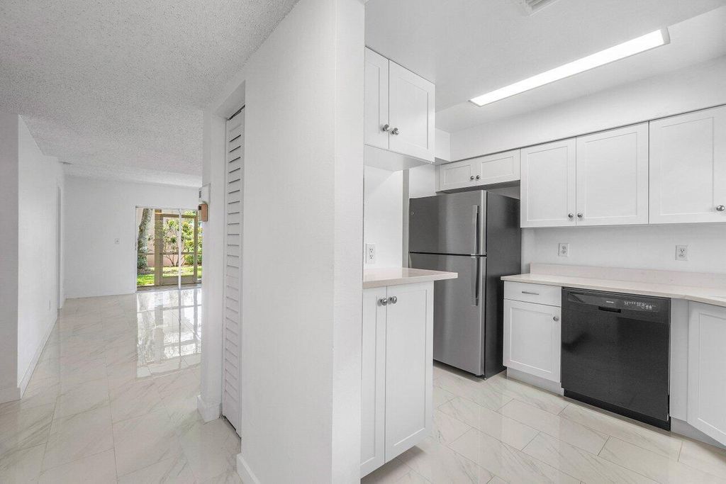 Photo of 18081 SE Country Club Drive #32-311, Jupiter, FL 33469 (MLS # R11091314)