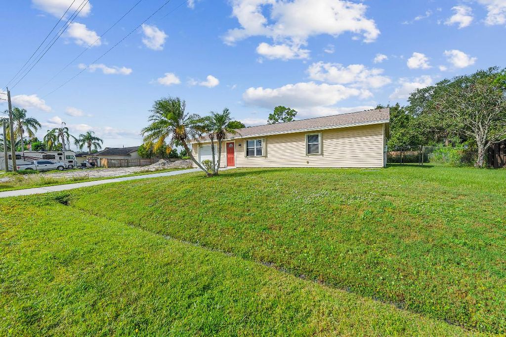 Photo of 1642 SW Import Drive, Port Saint Lucie, FL 34953 (MLS # R11140779)