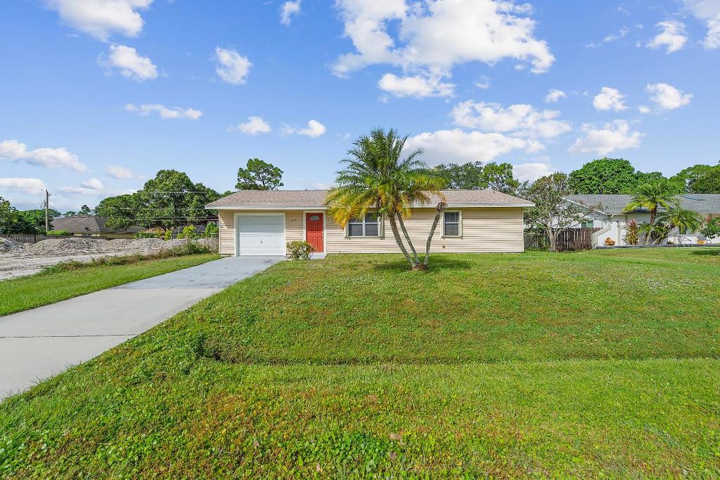 Photo of 1642 SW Import Drive, Port Saint Lucie, FL 34953 (MLS # R11140779)