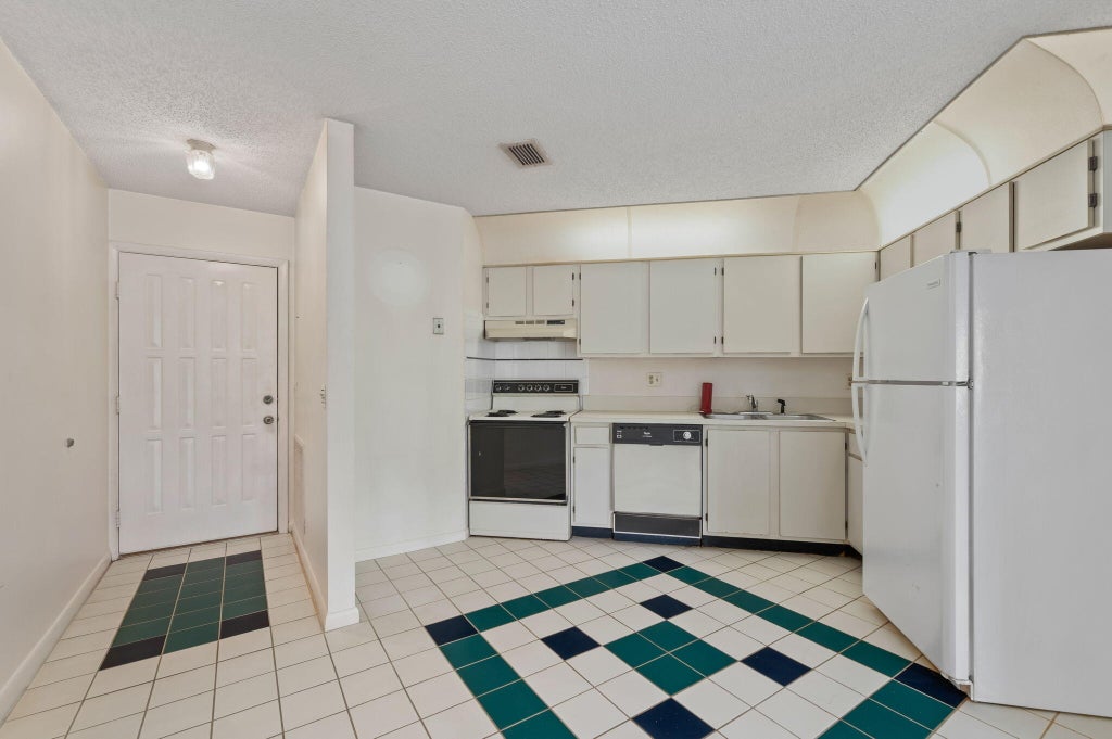 Photo of 1971 NE Collins Circle #110, Jensen Beach, FL 34957 (MLS # R11043274)