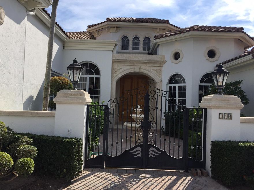 Newly reimagined Spanish Colonial-inspired deepwater estate on 130+/- ft. on the Buccaneer Palm Canal in prestigious Royal Palm Yacht & Country Club.A gated fountain courtyard leads to an impressive double door entry that opens to a rotunda foyer.  All major rooms are sun-filled throughout this single-level estate (except for the second level staff/housekeeper suite #6).Resort-style southeast pool/patio with separate entertainment pavilion.  Multi-yacht dockage just off the point of the Hillsboro River. 4-bay garage for the car enthusiast.  Shown by appointment only.