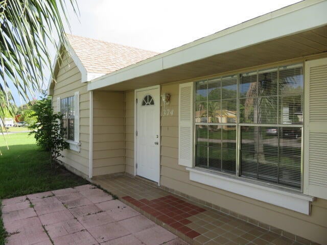 Photo of 374 SW Eastport Circle, Port Saint Lucie, FL 34953 (MLS # B26081716)
