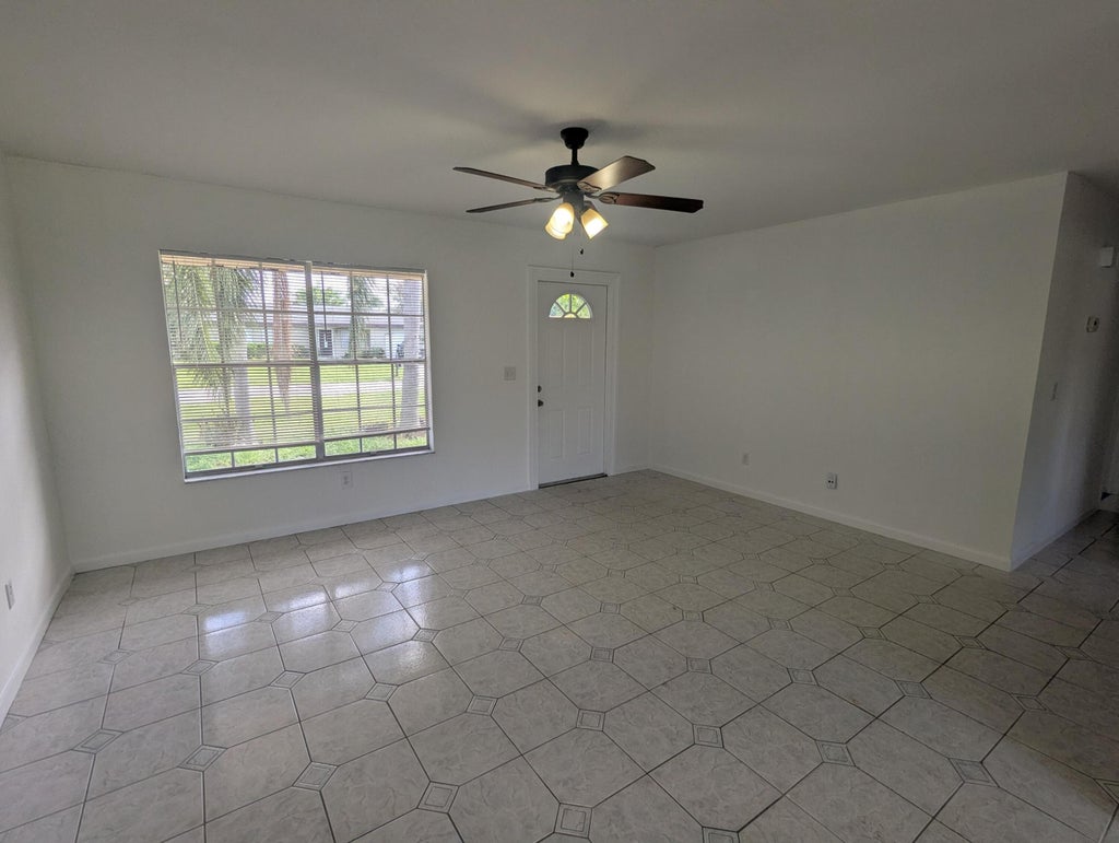 Photo of 374 SW Eastport Circle, Port Saint Lucie, FL 34953 (MLS # B26081716)