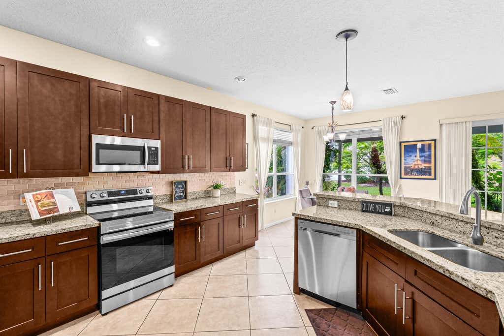 Photo of 21958 Palm Grass Drive, Boca Raton, FL 33428 (MLS # B26039118)