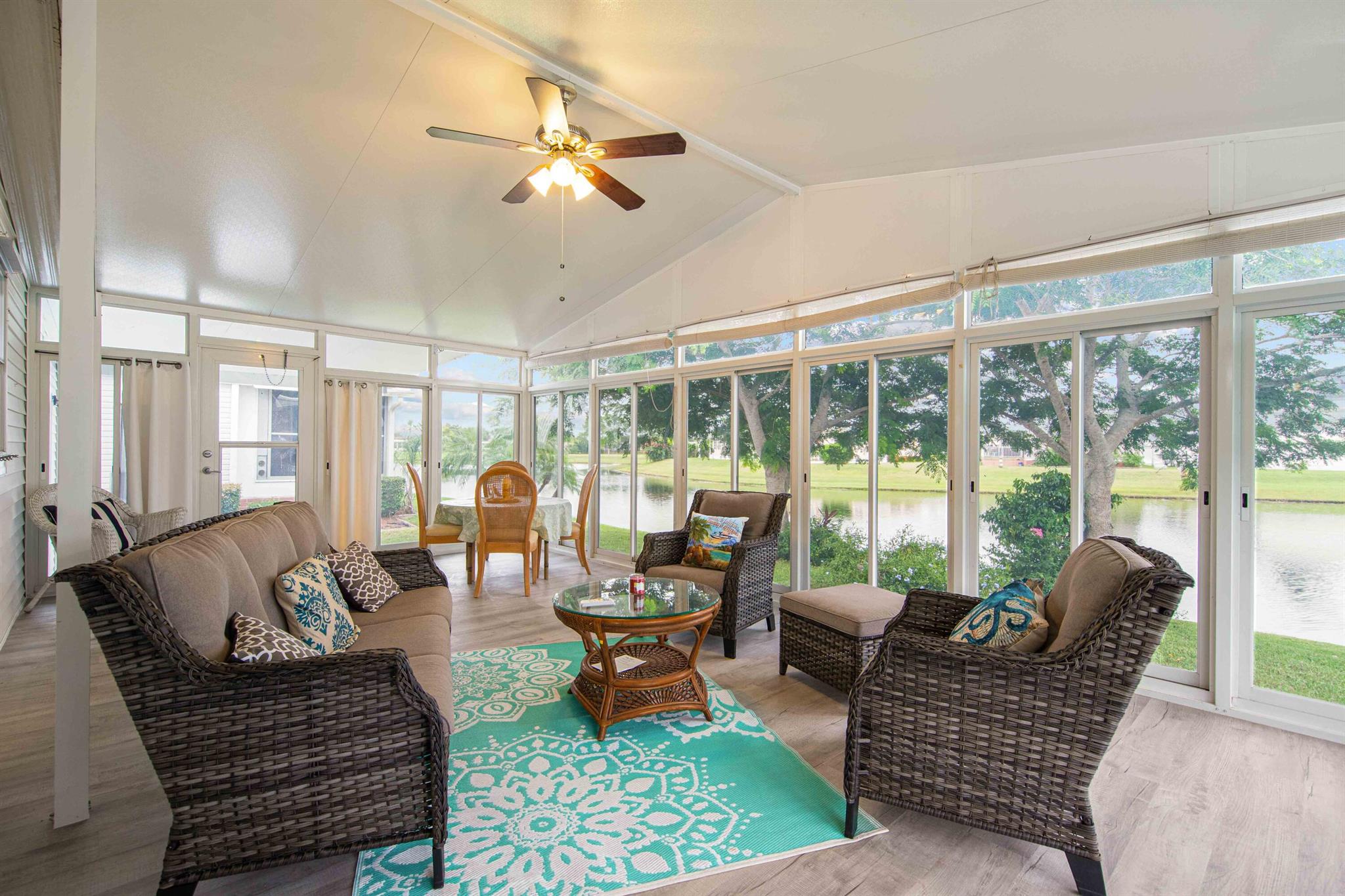 Location Location . Don't miss out on this newly remodeled. Absolutely beautiful two bedroom two bath home on the water. Move in ready, quick close. Lanai is overlooking the water also it is heated and cooled for your relaxing pleasure. Open floor plan. Amazing kitchen with all new cabinets. Brand new appliances. New doors. All new floors, Schedule your appointment today for your new home.This is a very active 55 and older community. Never a dull moment. Here are some of the Savanna Club activities. Tennis, Pickellball, Golf,Horseshoes, Shuffleboard, Bocca Ball. three Clubhouse with pools. Cable TV & Internet and Trash pick/up included. Minutes to the Beautiful beaches and much more.RV & Boats Storage on site