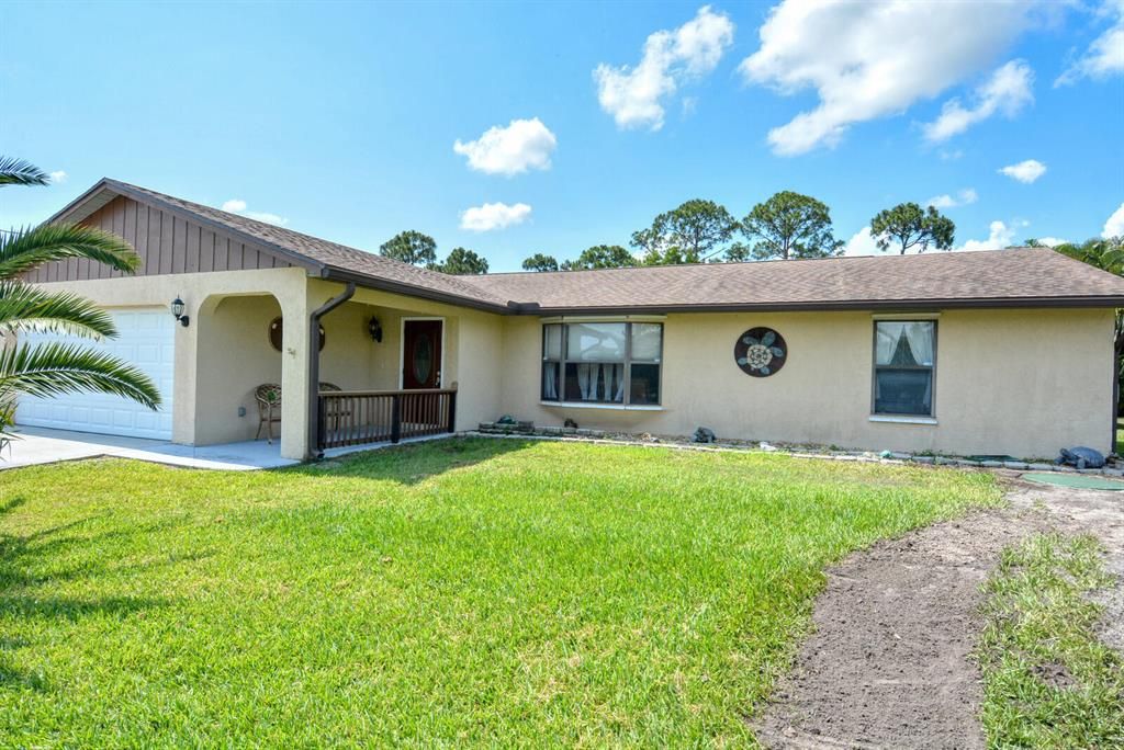 Photo of 834 SE Walters Terrace Ter, Port St Lucie, FL 34983 (MLS # R10799782)