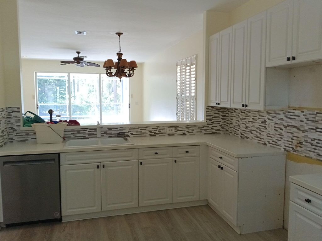 Photo of 3102 NW Windemere Drive, Jensen Beach, FL 34957 (MLS # B26042810)