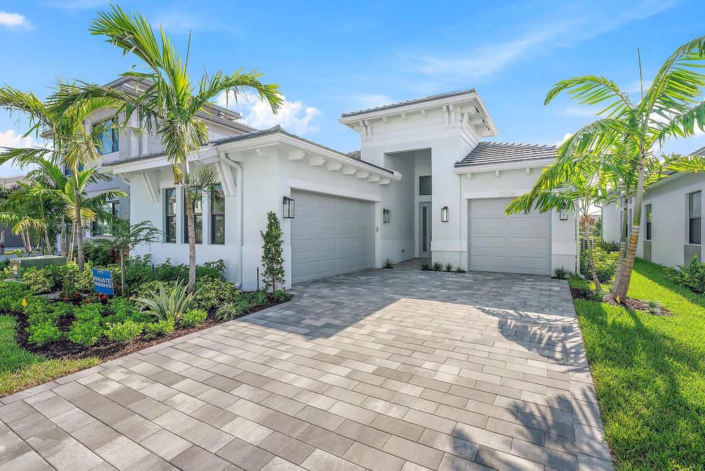 Photo of 10036 Heron Flock Drive, Palm Beach Gardens, FL 33412 (MLS # R11111745)