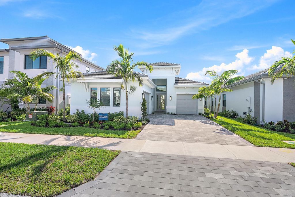 Photo of 10036 Heron Flock Drive, Palm Beach Gardens, FL 33412 (MLS # R11111745)