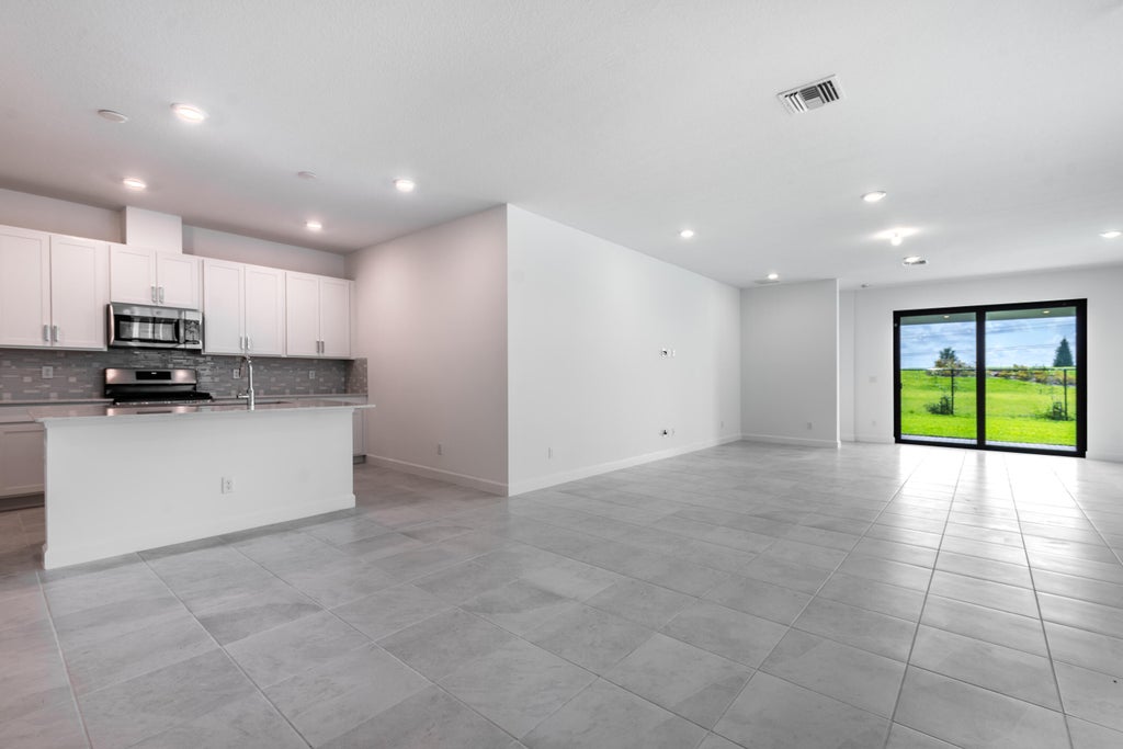 Photo of 1295 Tangled Orchard Trce Terrace, Loxahatchee, FL 33470 (MLS # R11003644)