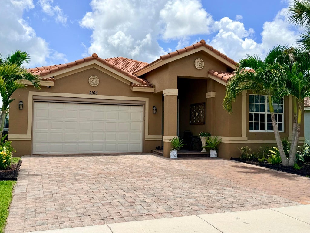 Photo of 2165 SW Newport Isles Boulevard, Port Saint Lucie, FL 34953 (MLS # B26040585)