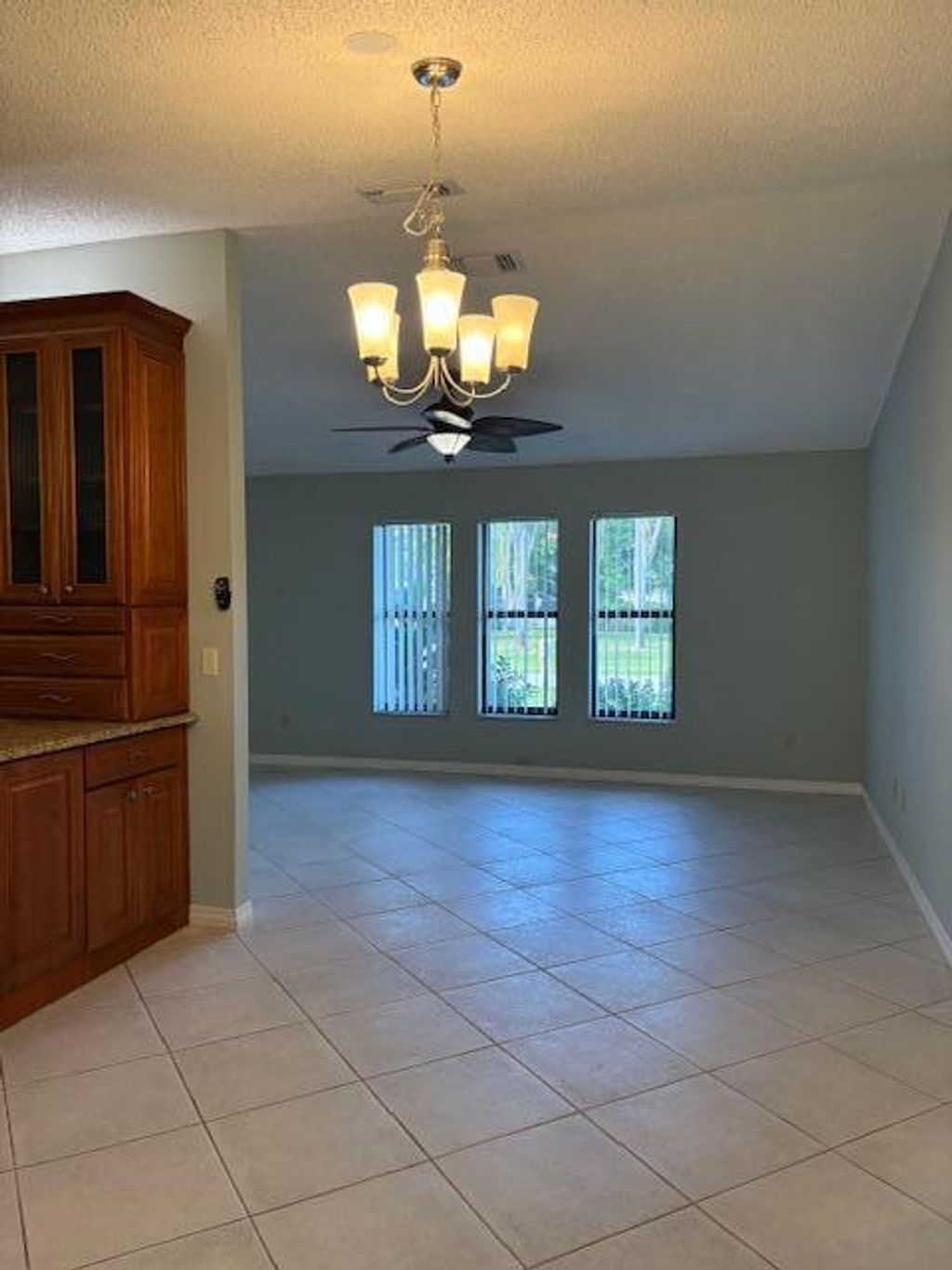 Photo of 400 SW Buxton Avenue, Port Saint Lucie, FL 34983 (MLS # R11139184)