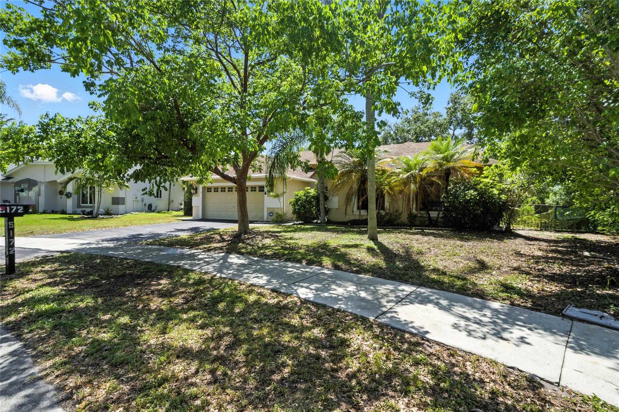 This spacious 4-bedroom, 2-bath home in desirable Winston Park features an open floorplan that connects the kitchen and living room, creating a welcoming ideal space for everyday living and entertaining. The front door opens to a direct view of the large private pool and expansive patio, blending indoor and outdoor living. Vinyl and tile flooring run throughout the home, offering both durability and low-maintenance style. Perfect for gatherings or quiet relaxation, the pool outdoor area includes an outdoor shower as well. Completing the home is a 2-car garage, providing ample storage and parking. This home offers comfort, functionality, and a great location in one of the area's most sought-after neighborhoods. This home WILL NOT LAST! All offers are subject to OFAC clearance.