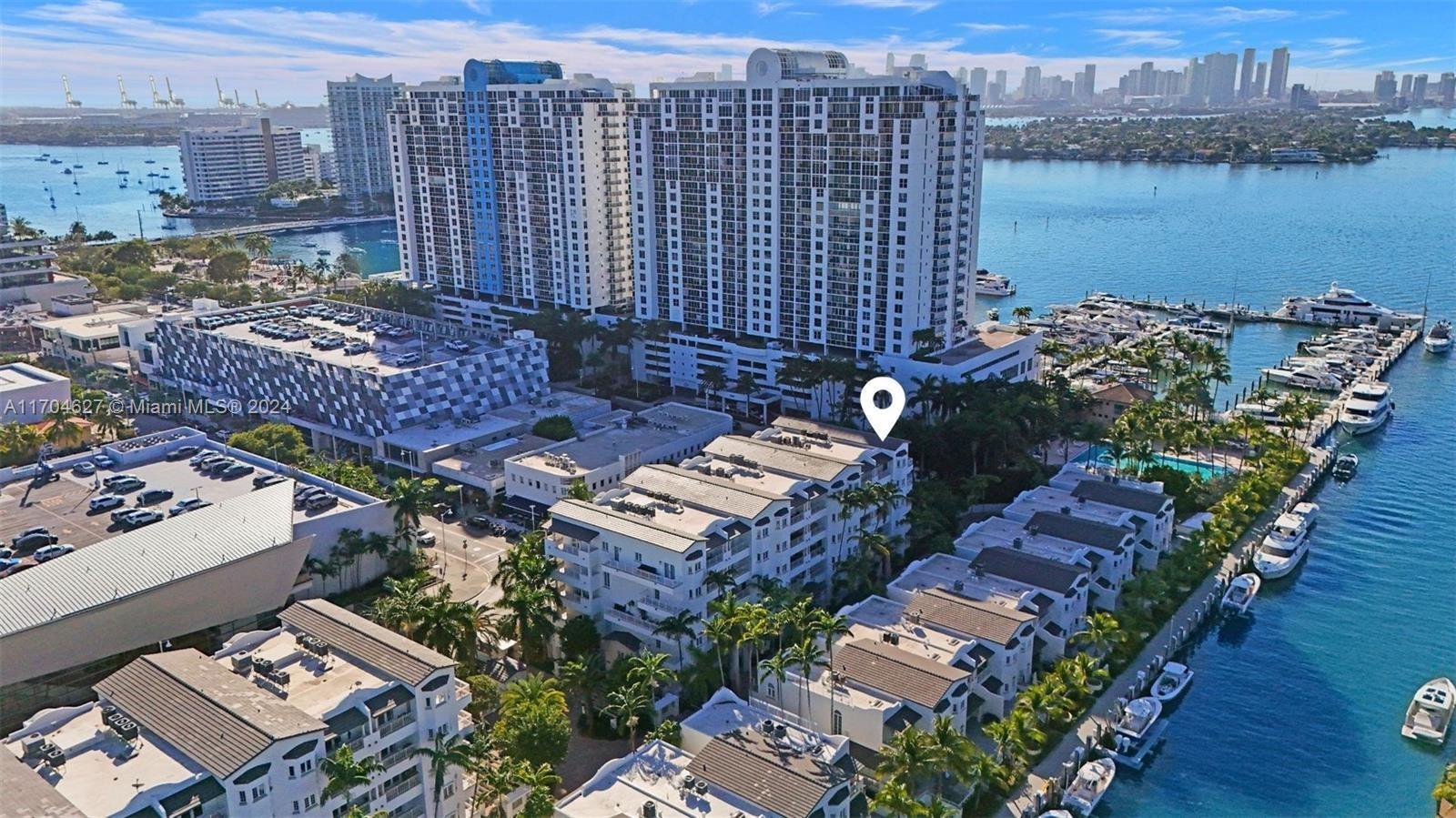 investors Dream! Property is rented for one year. Beautifully remodeled 2-story townhouse in the heart of Sunset Harbour, featuring 3 beds, 3 baths, 2,640 Sq Ft of living space, a renovated kitchen with Sub-Zero and Miele appliances, Arclinea cabinets, marble floors, four terraces, and a additional space ideal for an office or storage. The family room can be converted into a 4th bedroom with a private entrance. Located in a guard-gated waterfront community, it's steps from top restaurants, Fresh Market, Publix, and Lincoln Road's world-class shopping and entertainment. Enjoy access to the Sunset Harbour Yacht Club Marina, including a pool and lounge area. Great opportunity to own a stunning townhouse in one of Miami Beach's most desirable neighborhoods.